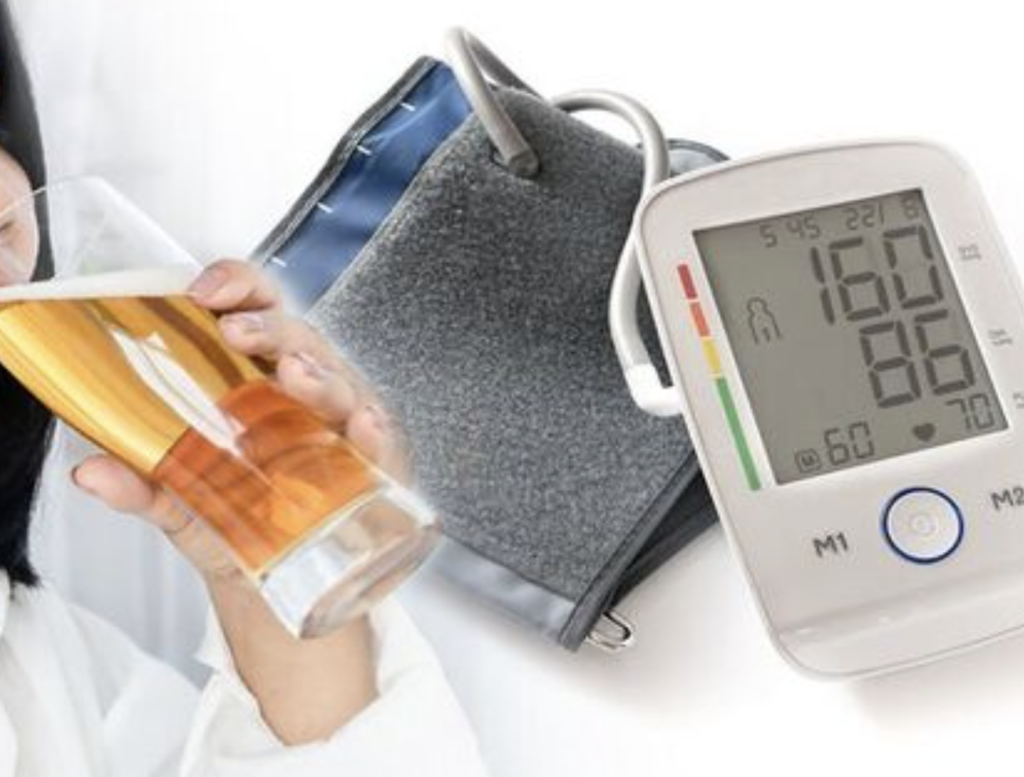 Person measuring blood pressure while considering alcohol consumption